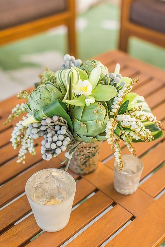 Succulent arrangement on wooden table at Williams Seylem Winery in Healdsburg; floral design by Healdsburg florist Aimee Lomeli Designs