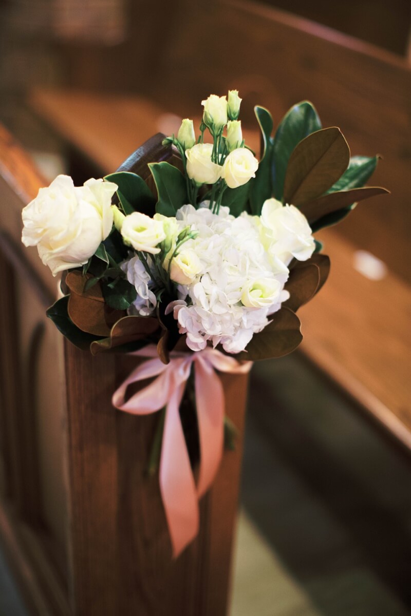 Hydrangea and magnolia leaf wedding flowers, floral pew marker, Aimee Lomeli Floral Design, Napa Valley Florist