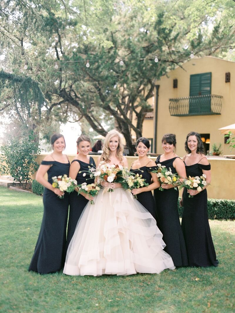 Bridesmaids in black dresses, Wine Country Wedding Reception at Andretti Winery, Aimee Lomeli Floral Design
