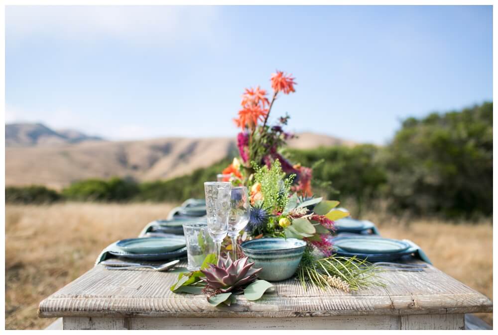 Bohemian wedding floral arrangement on a rustic table in the hills of Sonoma County