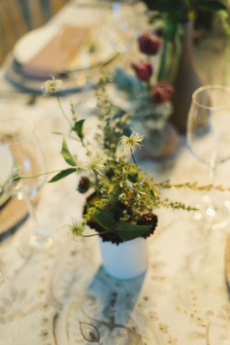 close up of a delicate floral arrangement on a tablescape