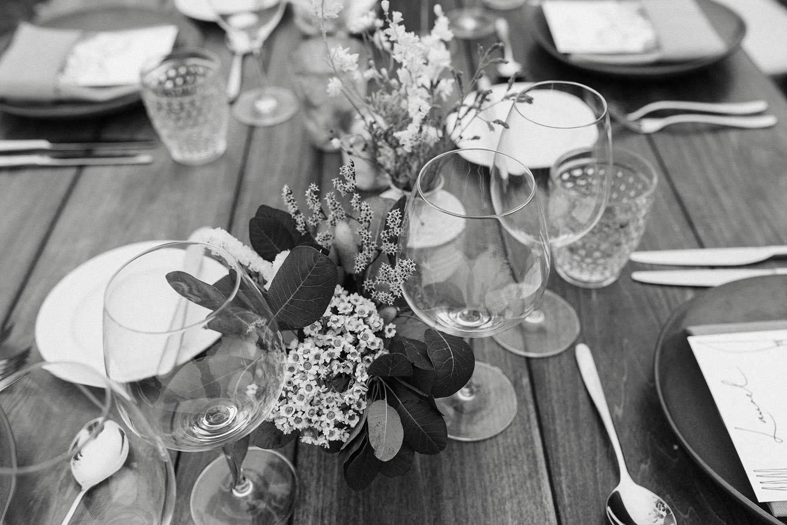 black and white photo of a dried and fresh flower wedding table arrangment